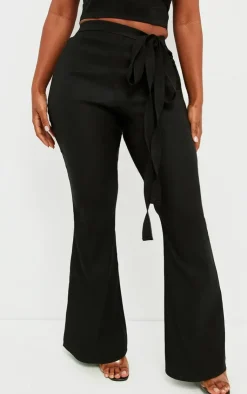 Clearance PrettyLittleThing Shape Stretch Woven Ring Detail Flare Pants Black