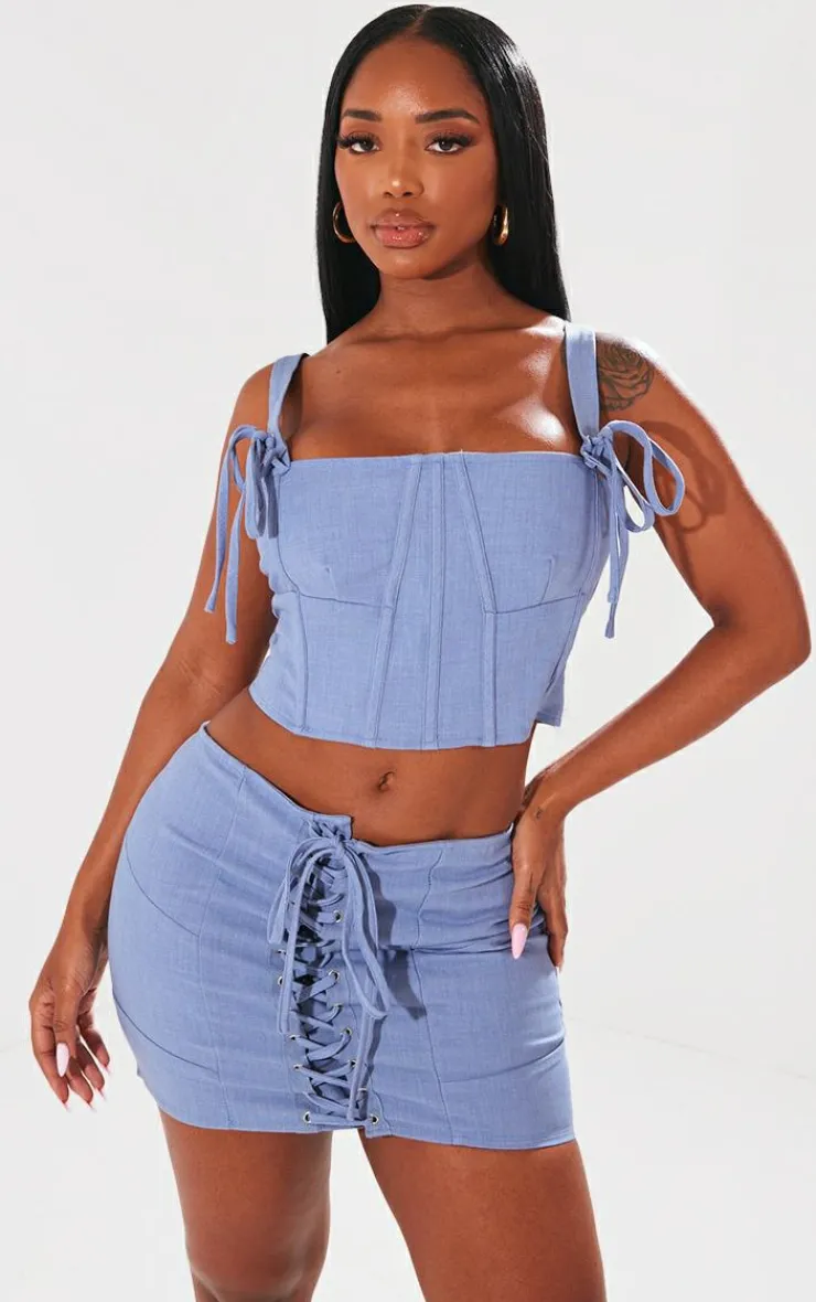 PrettyLittleThing Shape Woven Lace Up Detail Mini Skirt Blue