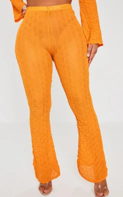 Discount PrettyLittleThing Shape Textured Sheer Wide Leg Pants Bright Orange
