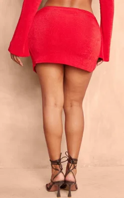 New PrettyLittleThing Shape Slinky Acetate Knot Detail Mini Skirt Bright Red