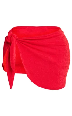 New PrettyLittleThing Shape Slinky Acetate Knot Detail Mini Skirt Bright Red