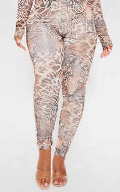 PrettyLittleThing Shape Leopard Denim Printed Slinky Leggings Brown