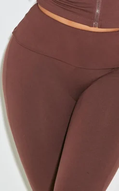 PrettyLittleThing Shape Stretch Sculpted Foldover Waist Flare Pants Brown