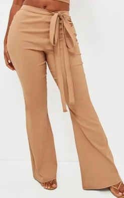 New PrettyLittleThing Shape Stretch Woven Ring Detail Flare Pants Camel