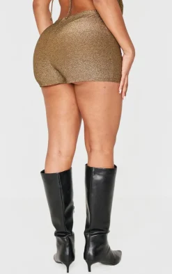 Online PrettyLittleThing Shape Glitter Lurex Mini Shorts Gold