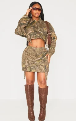 Discount PrettyLittleThing Shape Camo Printed Pocket Detail Mini Skirt Khaki