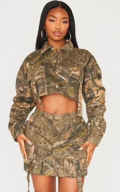 Discount PrettyLittleThing Shape Camo Printed Pocket Detail Mini Skirt Khaki