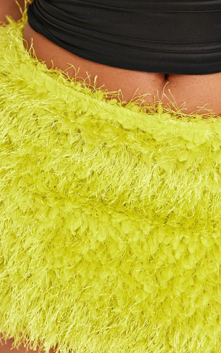 Shape Lime Low Rise Faux Leather Tassle Mini Skirt