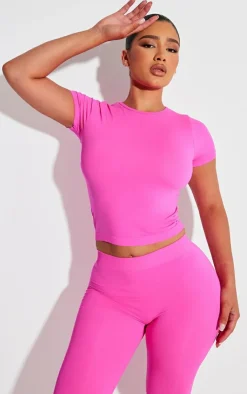 Online PrettyLittleThing Shape Stretch Seamless Short Sleeve Longline Top Neon Pink