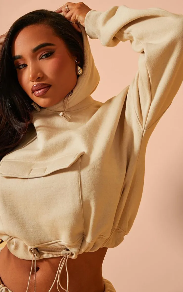PrettyLittleThing Shape Toggle Waist Pocket Front Cropped Hoodie Oatmeal