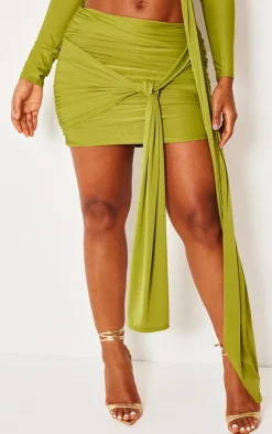 Sale PrettyLittleThing Shape Slinky Ruched Knot Side Mini Skirt Olive