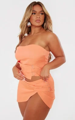 PrettyLittleThing Shape Buckle Detail Woven Mini Skirt Orange