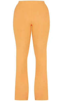 Hot PrettyLittleThing Shape Slinky Low Rise Flared Pants Orange