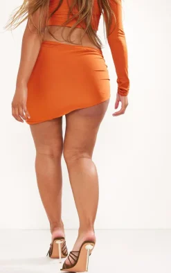 Hot PrettyLittleThing Shape Slinky Ruched Asymmetric Side Mini Skirt Orange