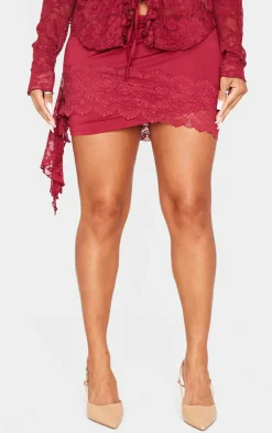 PrettyLittleThing Shape Drape Lace Side Mini Skirt Red