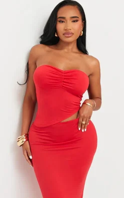 Discount PrettyLittleThing Shape Jersey Bandeau Asymmetric Hem Top Red