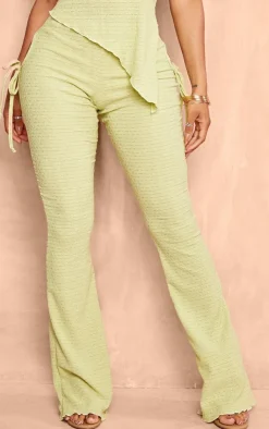 New PrettyLittleThing Shape Textured Cut Out Flare Pants Sage Green