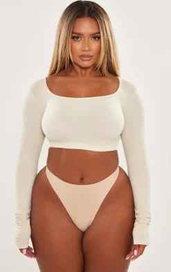 PrettyLittleThing Snatched*Shape Stretch Seamless Scoop Neck Long Sleeve Crop Top