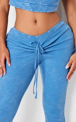 PrettyLittleThing Shape Washed Ribbed Ruched Front Flare Pants Washed Blue
