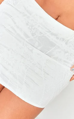 Sale PrettyLittleThing Shape Embroidered Low Rise Mini Skirt White