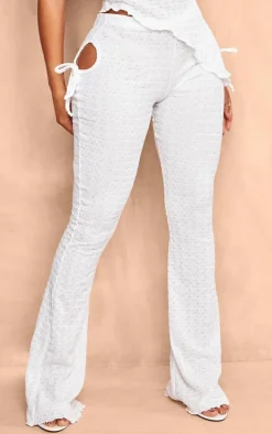 PrettyLittleThing Shape Textured Cut Out Flare Pants White