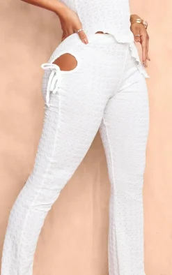 PrettyLittleThing Shape Textured Cut Out Flare Pants White
