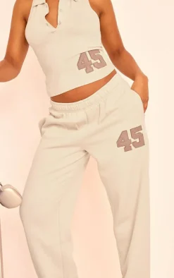 New PrettyLittleThing Embroidered 45 Graphic Wide Leg Sweatpants Stone