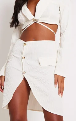 Online PrettyLittleThing Tall Textured Button Front Mini Skirt Beige