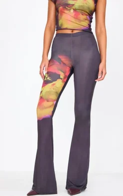 New PrettyLittleThing Tall Floral Print Flared Pants Black