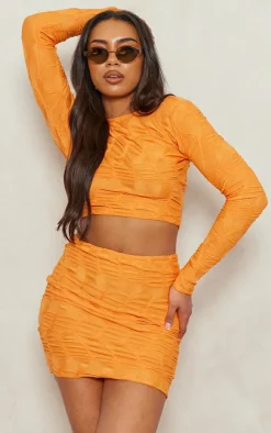 PrettyLittleThing Tall Textured Jersey Long Sleeve Backless Top Orange