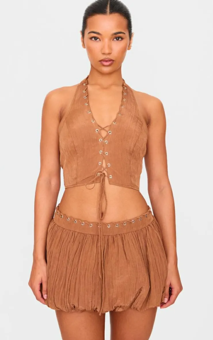 Discount PrettyLittleThing Tan Crinkle Eyelet Detail Halterneck Top Tan.