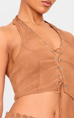 Discount PrettyLittleThing Tan Crinkle Eyelet Detail Halterneck Top Tan.