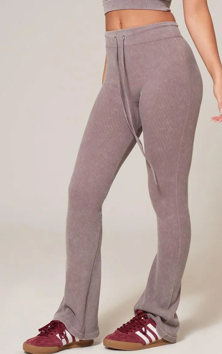 Online PrettyLittleThing Taupe Faded Snatched Rib Tie Waist Skinny Flare Pants Taupe.