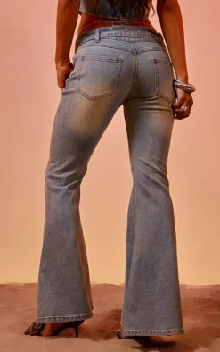 Discount PrettyLittleThing Vintage Blue Wash Buckle Detail Western Style Flared Jeans Vintage Wash