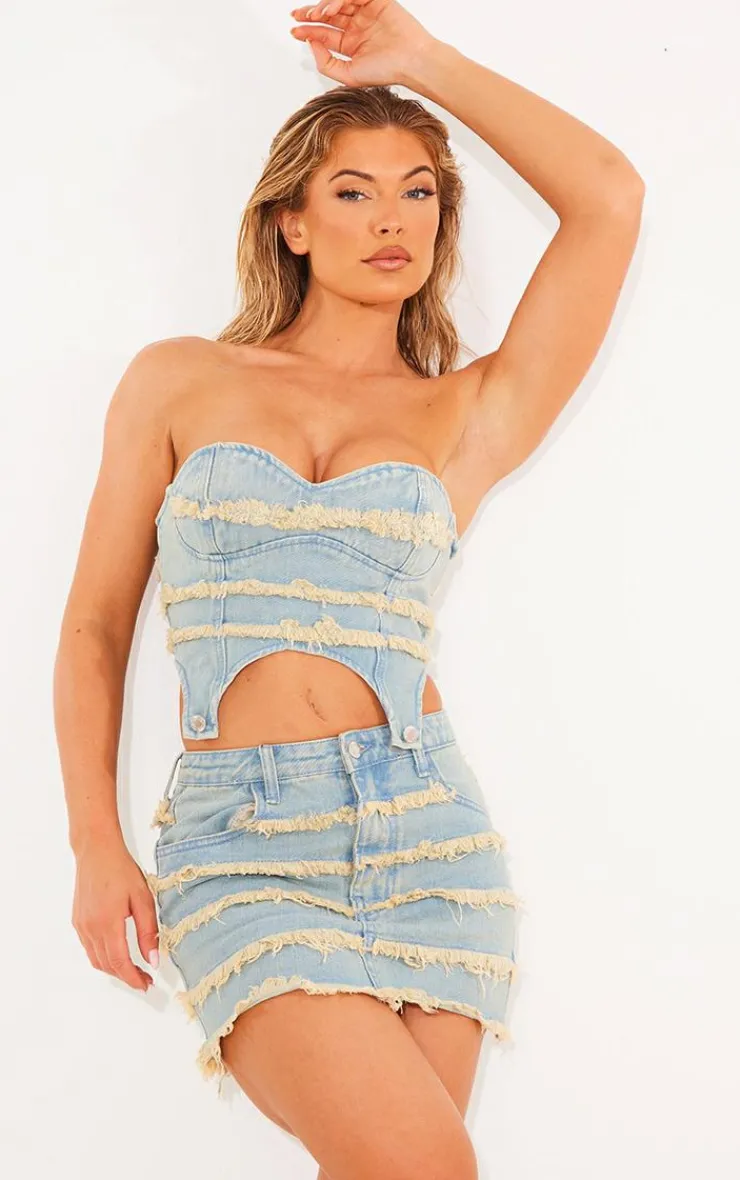 Online PrettyLittleThing Frayed Seam Detail Denim Corset Vintage Wash