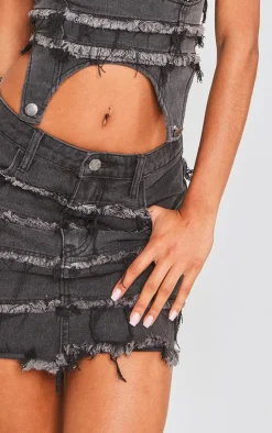 PrettyLittleThing Frayed Seam Detail Mini Denim Skirt Washed Black