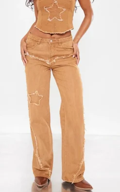 New PrettyLittleThing Raw Hem Detail Star Applique Wide Leg Jeans Washed Brown