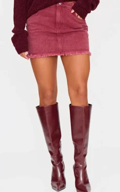 Hot PrettyLittleThing Washed Raw Hem Denim Mini Skirt Burgundy