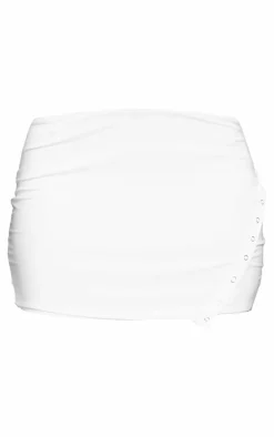 Online PrettyLittleThing Slinky Low Rise Slit Hem Eyelet Detail Micro Mini Skirt White