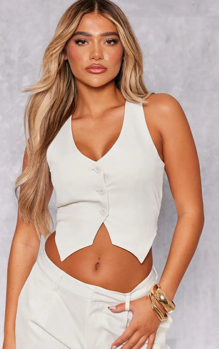 PrettyLittleThing White Woven Tailored Cross Over Back Detail Vest Cream
