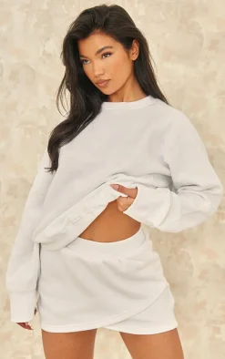 New PrettyLittleThing Wrap Over Sweat Mini Skirt White
