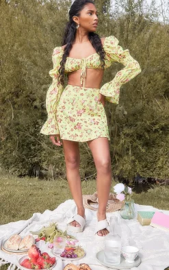 PrettyLittleThing Floral Printed Skater Mini Skirt Yellow
